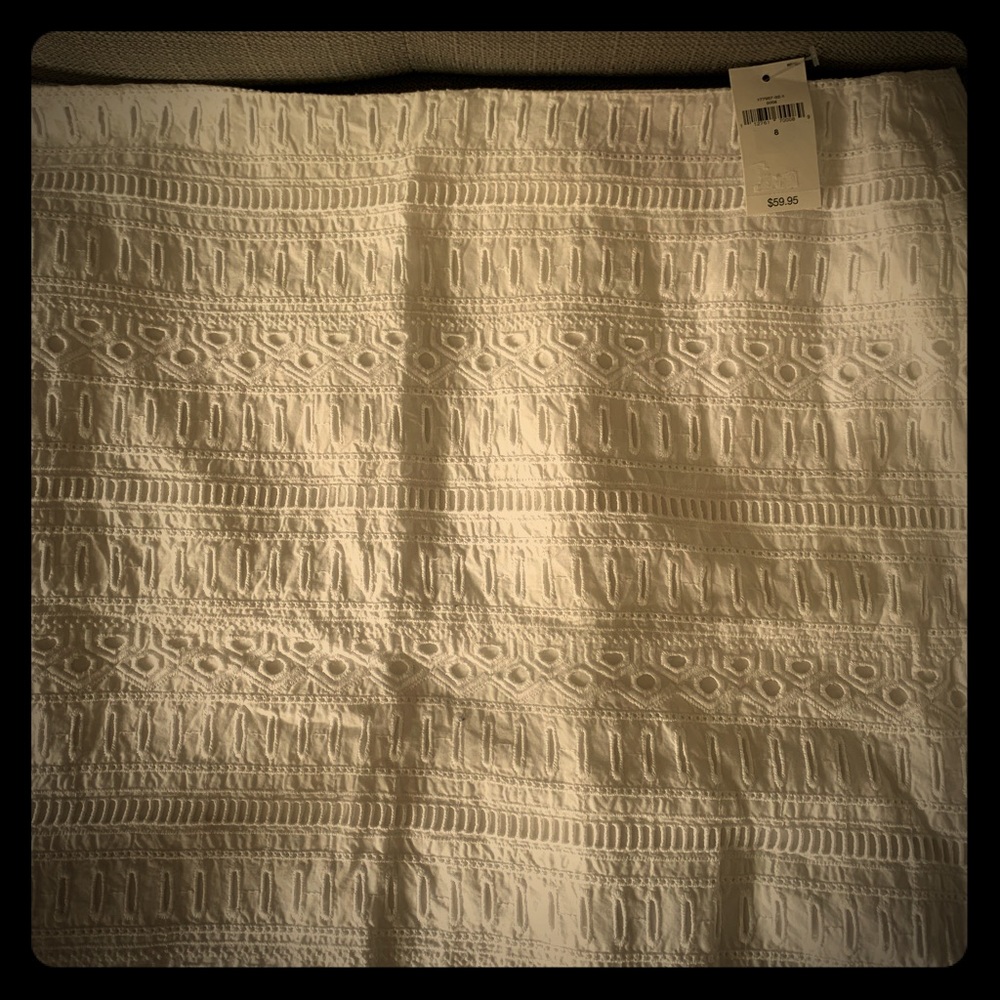 Short white eyelet skirt
